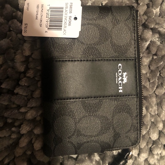 black Coach wristlet nwt and care instructions - Picture 1 of 3